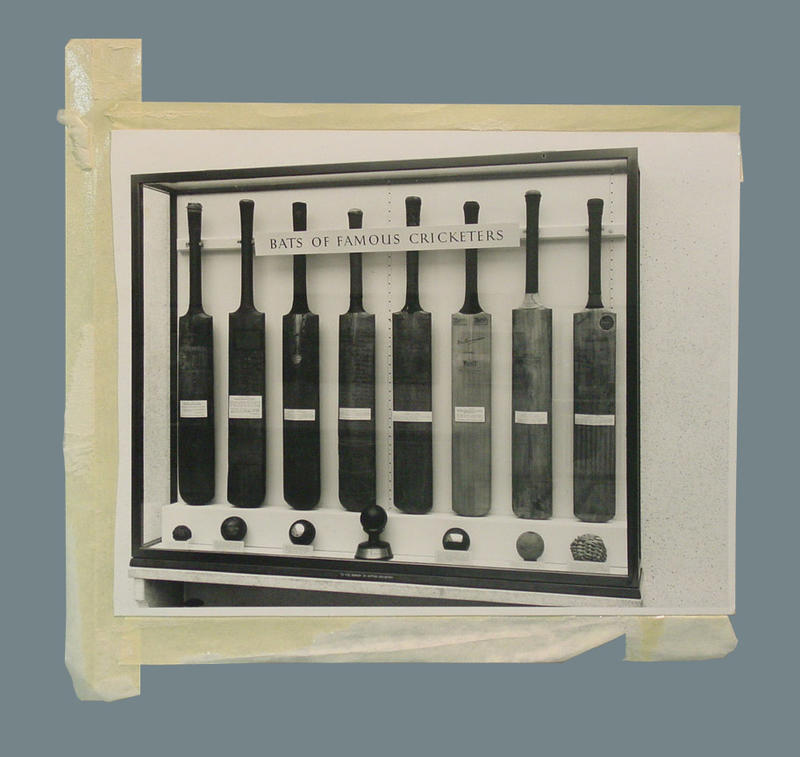 Photograph of showcase, "Bats of Famous Cricketers" Australian Sports