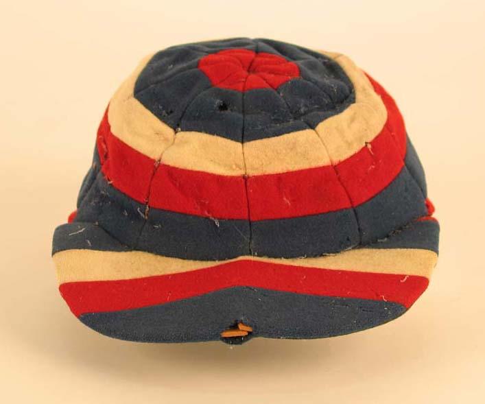 An English local cricket team cap, striped, made by Foster in London